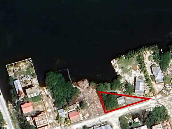 Aerial view of beachfront property for sale in Belize.