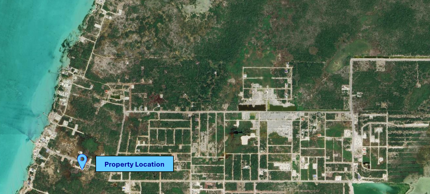 Aerial close-up of the property showing approximately half the lot already filled.