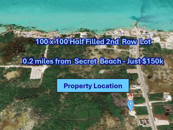 Aerial view of the property looking Across Secret Beach toward the Caribbean Sea.